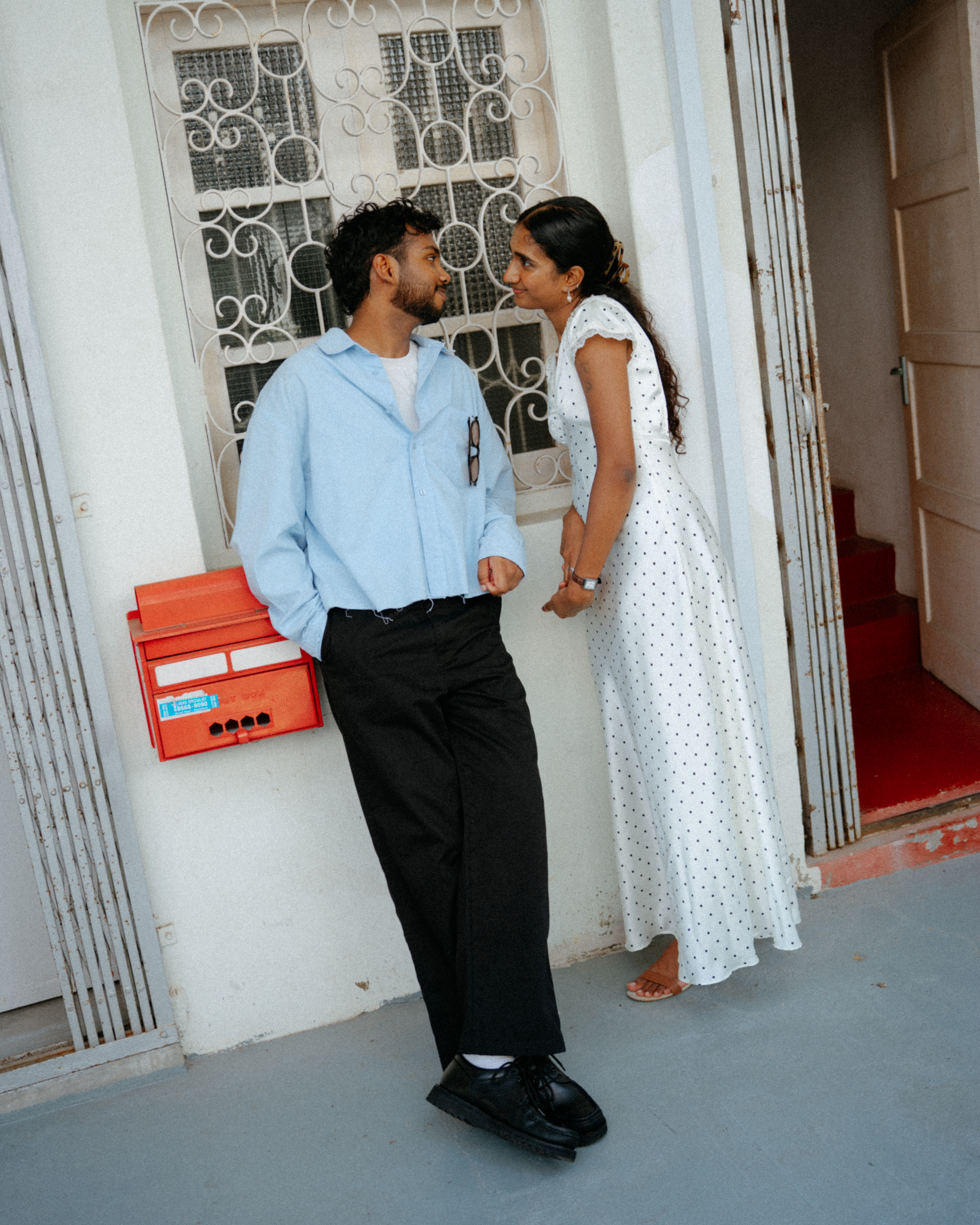 Janani and Dhanush sharing a quiet couple portrait